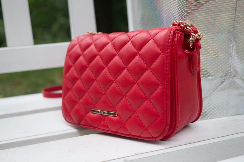 Definitive Guide To The Prada Handbag History Care Authentication And Styling